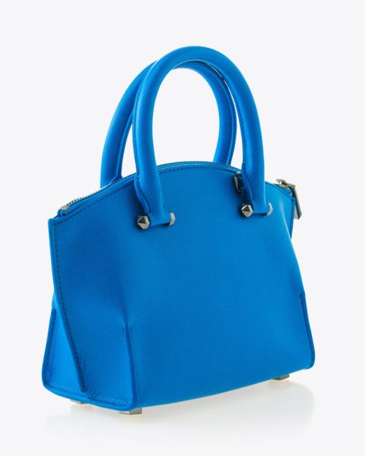 A small, bright blue handbag with a structured shape, double handles, silver hardware, and a textured finish, displayed on a plain white background.