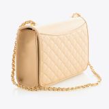 A beige quilted leather handbag with a gold chain strap, displayed at an angle on a white background. The bag has a flap closure and diamond stitching pattern.