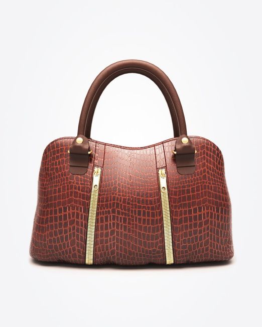 A brown, crocodile-patterned leather handbag with two sturdy handles and two vertical gold zippers on the front, displayed against a plain white background.