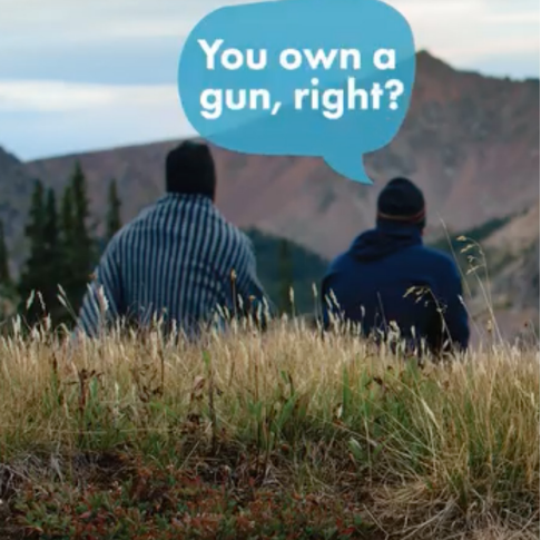 Two people sit on grass in the mountains, seen from behind. One has a blanket over their shoulders. A speech bubble above them says, You own a gun, right?.